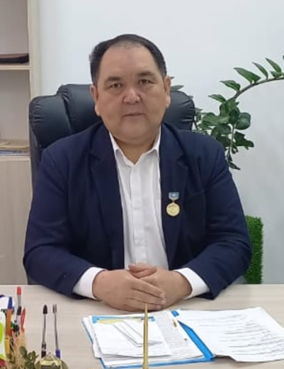 Мухтар Жумадилович Байбеков - мектеп директоры